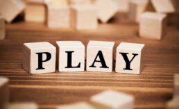 cubes spelling out PLAY