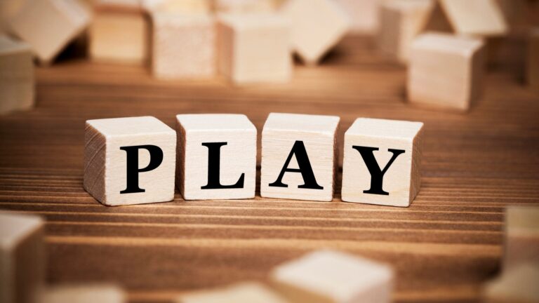 cubes spelling out PLAY